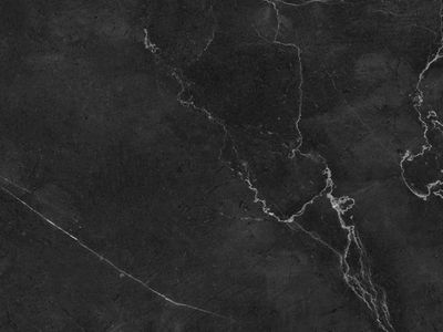 Smooth blue stones on a dark surface